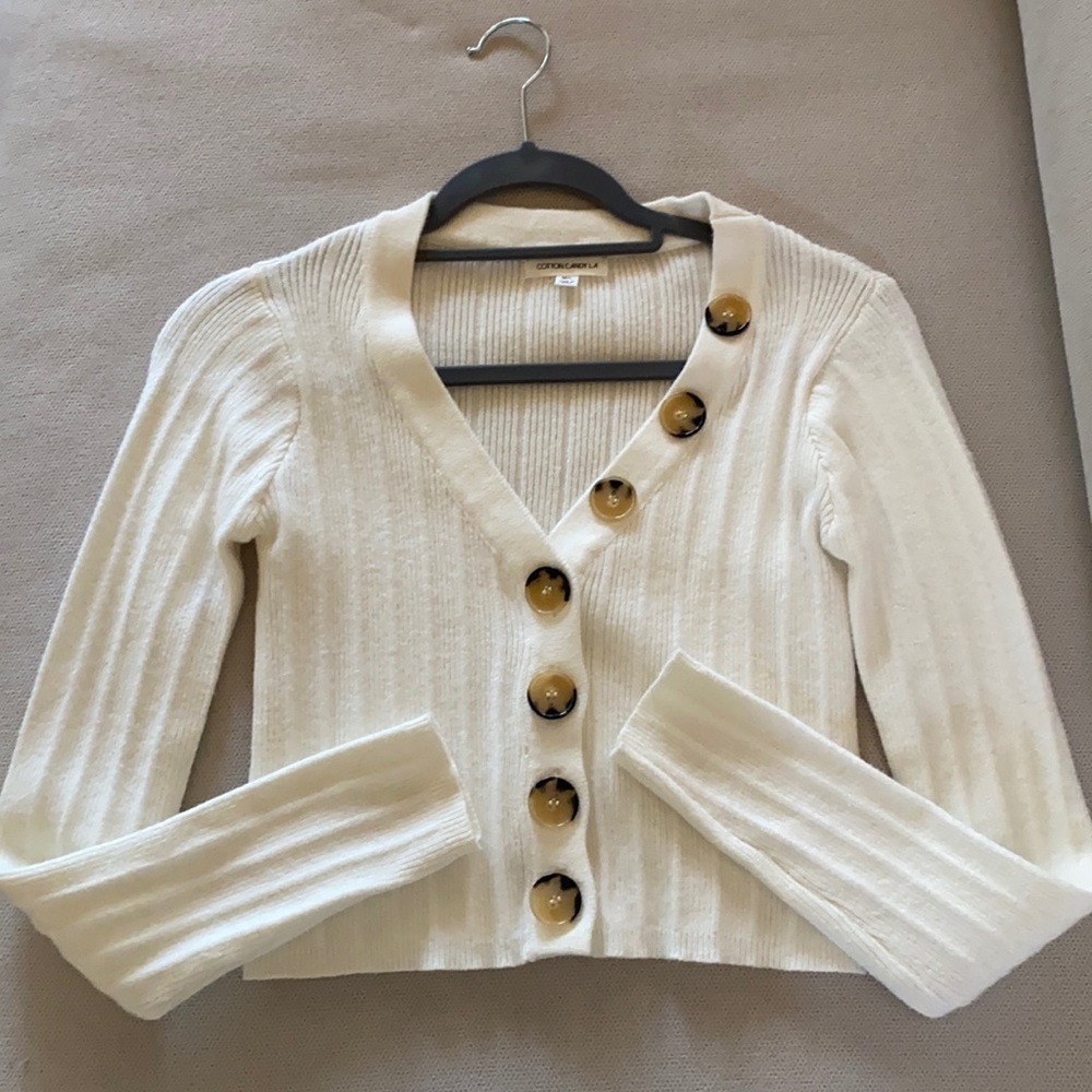 Knit crop sweater with button detail
